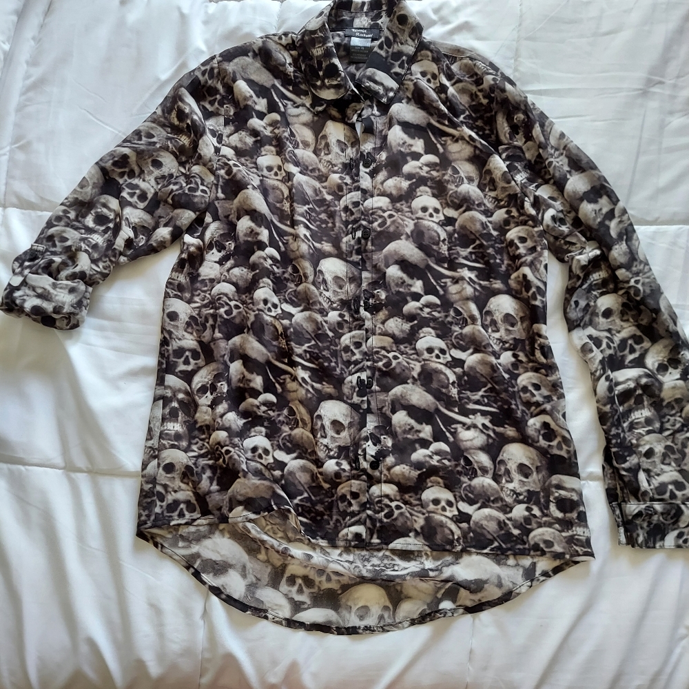 Skulls button up top